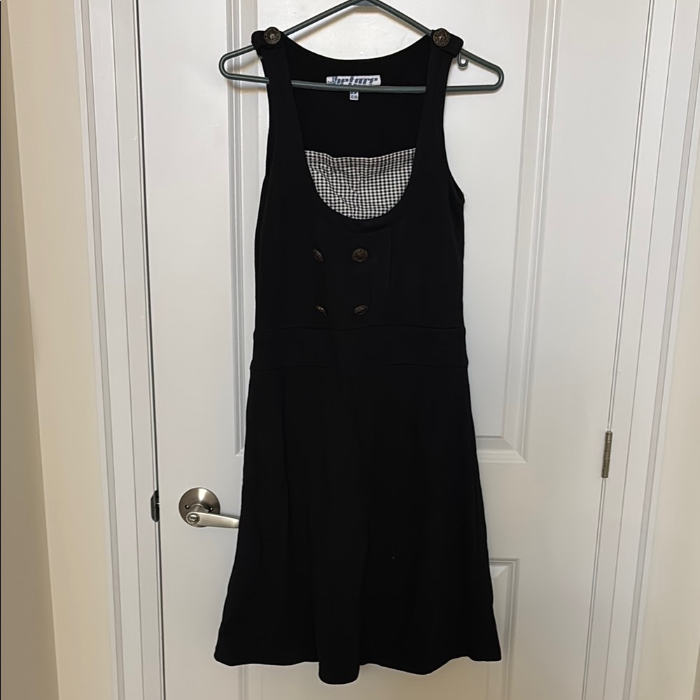Black dress with button decor